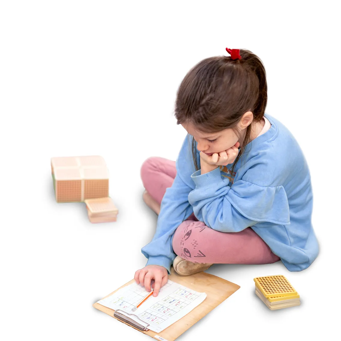 Dzieci przy pracy z pomocami Montessori